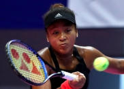 Tennis - Pan Pacific Open Women's Singles Semifinal match - Arena Tachikawa Tachihi, Tokyo, Japan - September 22, 2018. Naomi Osaka of Japan returns a ball to Camila Giorgi of Italy. REUTERS/Toru Hanai