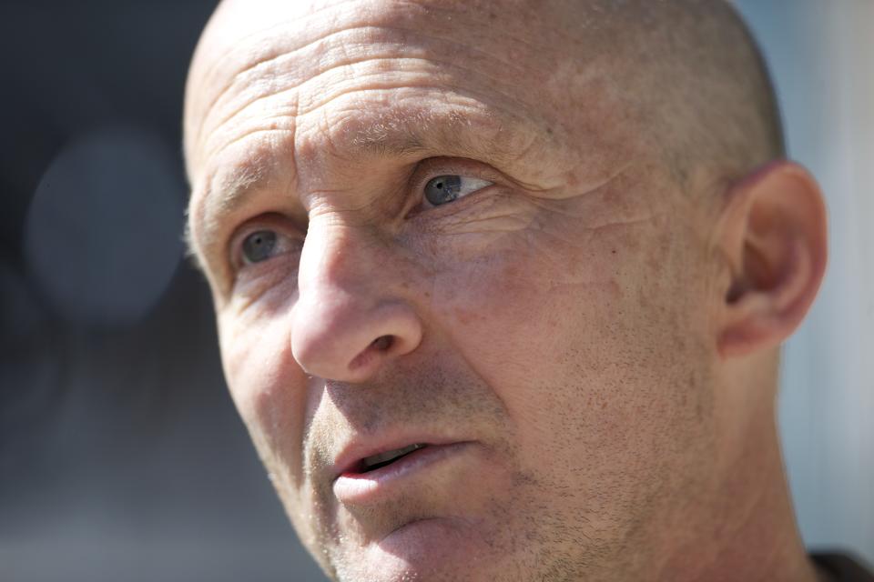 FILE - Portland Thorns head coach Paul Riley talks with the media after a team practice in Portland, Ore., April 9, 2014. An independent investigation into the scandals that erupted in the National Women's Soccer League last season found emotional abuse and sexual misconduct were systemic in the sport, impacting multiple teams, coaches and players, according to a report released Monday, Oct. 3, 2022. U.S. Soccer commissioned the investigation after former NWSL players Sinead Farrelly and Mana Shim came forward with allegations of harassment and sexual coercion dating back a decade involving former coach Paul Riley. (Randy L. Rasmussen/The Oregonian via AP, File)