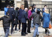 Scotland's First Minister and Scottish National Party leader Nicola Sturgeon, centre right, speaks to the media, at Bute House in Edinburgh, Scotland. Sunday, May 9, 2021. British Prime Minister Boris Johnson has invited the leaders of the U.K.’s devolved nations for crisis talks on the union after Scotland’s pro-independence party won its fourth straight parliamentary election. Sturgeon said the election results proved a second independence vote for Scotland was “the will of the country." She said any London politician who stood in the way would be “picking a fight with the democratic wishes of the Scottish people.” (AP Photo/Scott Heppell)