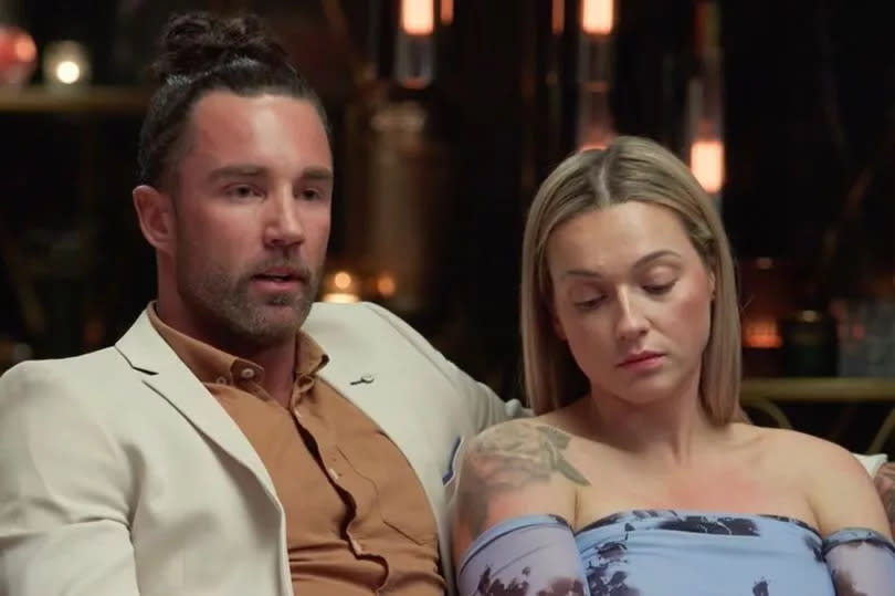 An embarrassed Jack tries to explain why he went on the programme whilst already dating someone. Beside him, wife Tori looks away from the camera and relationship experts, embarrassed