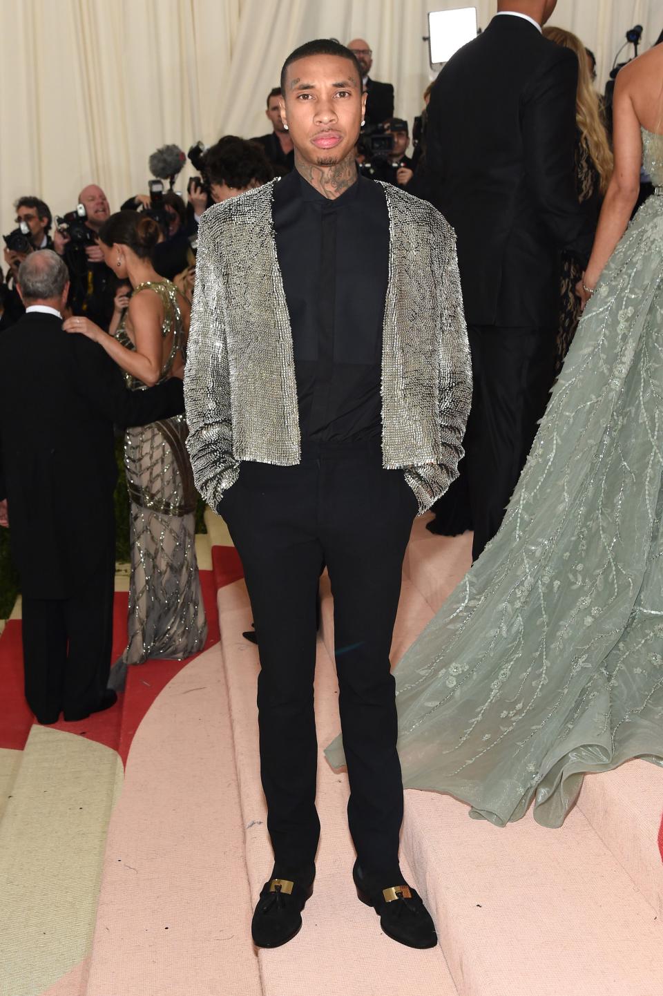 <h1 class="title">Tyga in Balmain</h1><cite class="credit">Photo: Getty Images</cite>