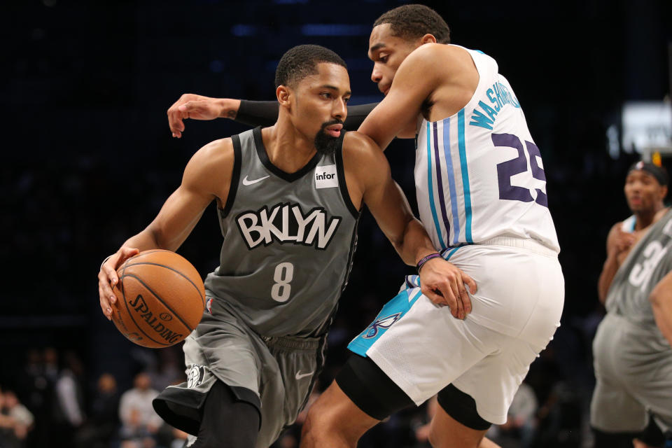 Dec 11, 2019; Brooklyn, NY, USA; Brooklyn Nets point guard Spencer Dinwiddie (8) drives around Charlotte Hornets power forward PJ Washington (25) during the fourth quarter at Barclays Center. Mandatory Credit: Brad Penner-USA TODAY Sports