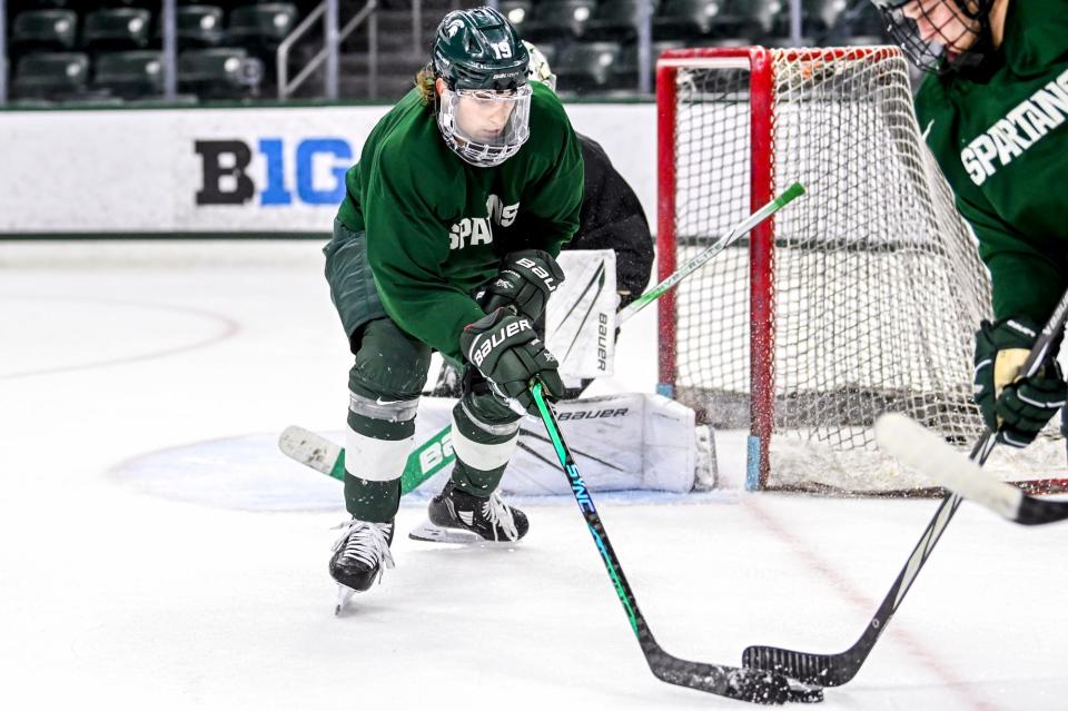 Michigan State's Nicolas Muller goes after the puck in practice during hockey media day on Wednesday, Sept. 27, 2023, at Munn Arena in East Lansing.