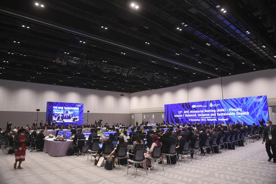 Attendees prepare for the 33rd APEC Ministerial Meeting (AMM) plenary session during the APEC summit, Thursday, Nov. 17, 2022, in Bangkok, Thailand. (Chalinee Thirasupa/Pool Photo via AP)