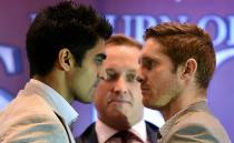 <p>Indian boxer Vijender Singh (L) and Australia’s Kerry Hope face off during an event in New Delhi on June 6, 2016. Olympic bronze medallist Singh, who turned pro last year, is gearing up for the World Boxing Organisation (WBO) – Asian Middleweight title bout against Australia’s Kerry Hope in New Delhi on July 16. </p>