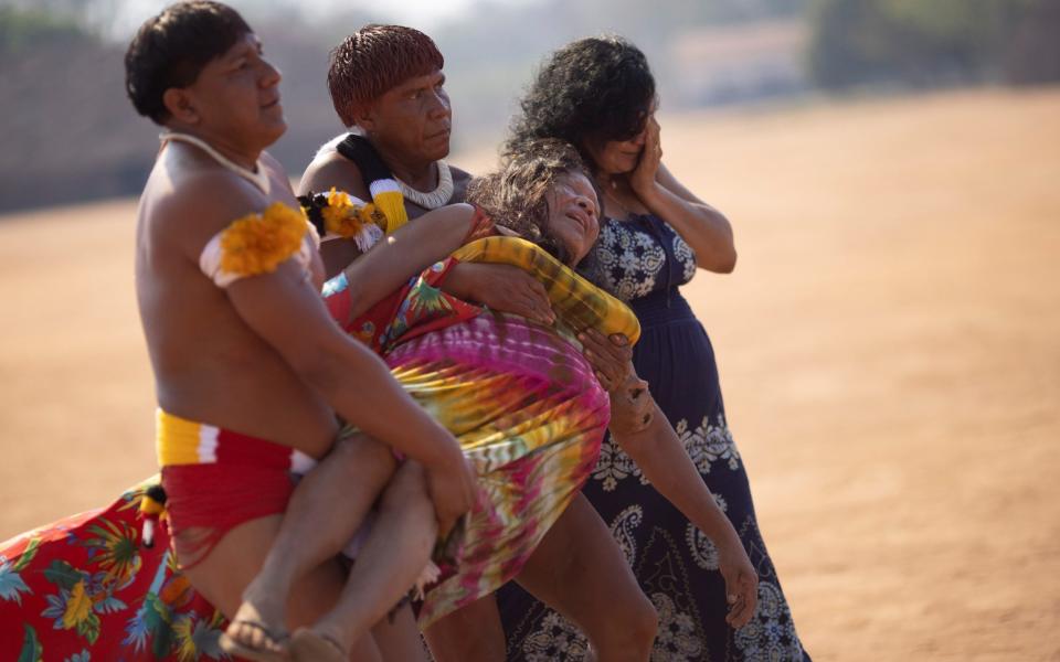 Besieged Amazon tribes grant rare access to Xingu chief’s funeral rites - UESLEI MARCELINO /REUTERS