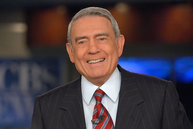 <p>John Paul Filo/CBS via Getty</p> Dan Rather anchors his last 'CBS Evening News' broadcast on March 9, 2005