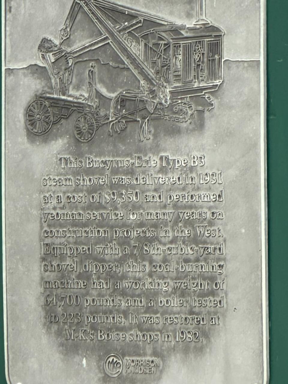 This plate on the steam shovel at ITD headquarters gives the history of the steam shovel. It was delivered to Morrison-Knudsen in 1931 at a cost of $9,350.