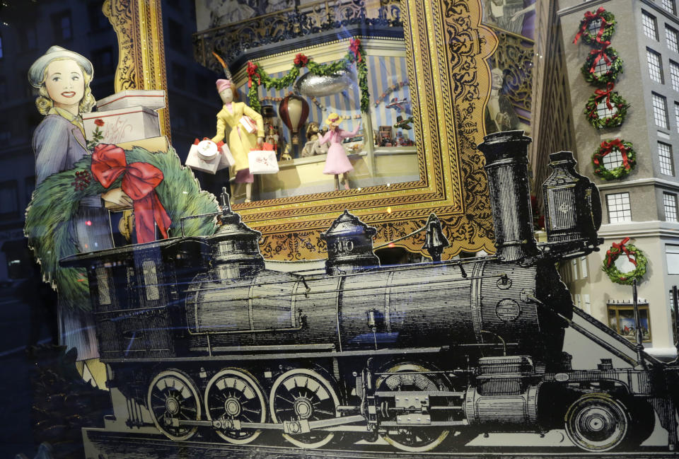 This Nov. 18, 2013 photo shows a vintage holiday shopping window display featured at Lord & Taylor department store, in New York. Forget window shopping, some of Manhattan’s biggest and most storied retailers say their elaborate seasonal window displays are a gift to passers-by. (AP Photo/Mark Lennihan)