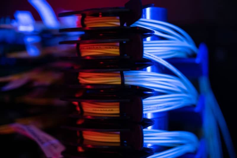 Fiber optic bundles lie in a server rack. The German government has awarded a major IT contract to cloud services provider Ionos worth some €410 million ($440 million), Ionos reported on Tuesday. Sebastian Gollnow/dpa