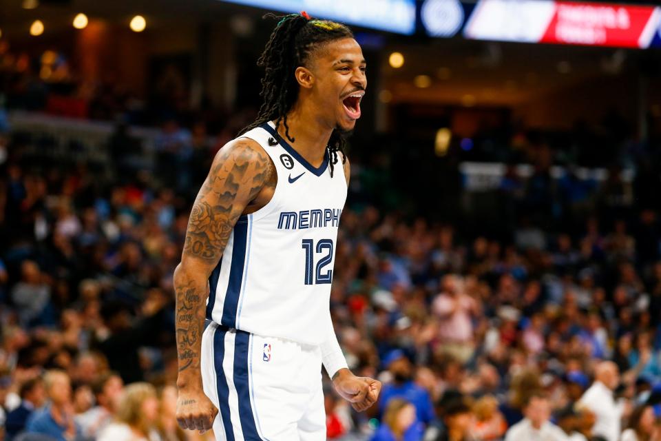 Grizzlies' Ja Morant (12) reacts after passing the ball down the court for an assist during the game between the Memphis Grizzlies and Portland Trail Blazers at FedExForum in Memphis, Tenn., on April 4, 2023.