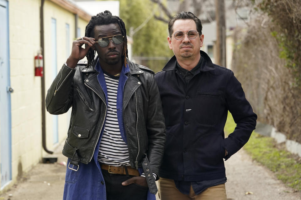 Adrian Quesada, left, and Eric Burton, of Black Pumas, pose for a portrait in Austin, Texas on Feb. 5, 2021. Their deluxe debut album is nominated for album of the year at the 2021 Grammy Awards and their single “Colors” is nominated for record of the year and best American roots performance. (AP Photo/Eric Gay)