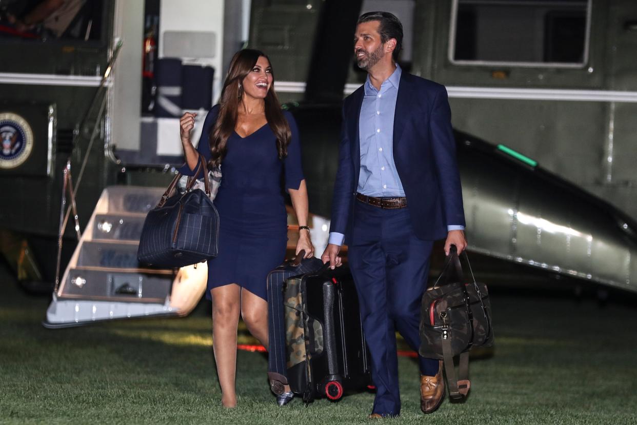 Donald Trump Jr and Kimberly Guilfoyle arrive at the White House after a trip to Cincinnati, Ohio: EPA