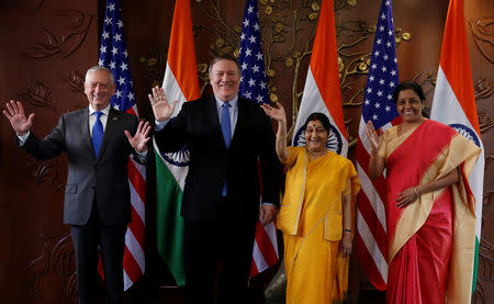 U.S. Secretary of State Mike Pompeo and Secretary of Defence James Mattis pose beside India’s Foreign Minister Sushma Swaraj and Defence Minister Nirmala Sitharaman before the start of their meeting in New Delhi, September 6, 2018. REUTERS/Adnan Abidi