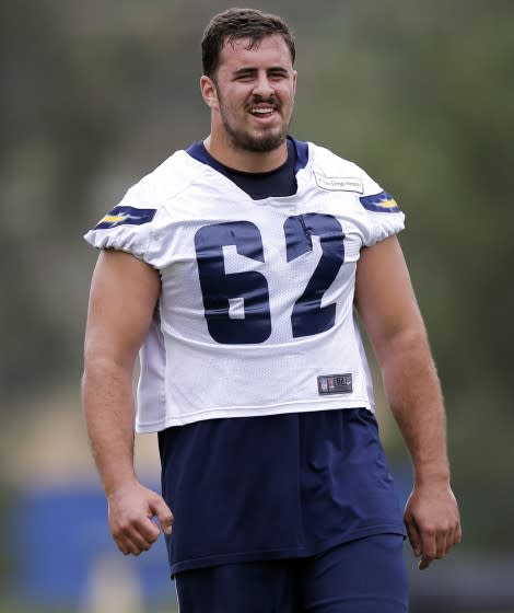 San Diego Chargers center Max Tuerk stands on the field.