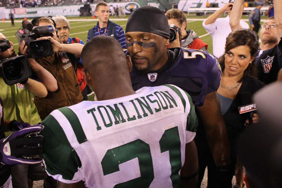 EAST RUTHERFORD, NJ - SEPTEMBER 13: Ray Lewis #52 of the Baltimore Ravens talks to LaDainian Tomlinson #21 of the New York Jets after defeating the New York Jets in their home opener at the New Meadowlands Stadium on September 13, 2010 in East Rutherford, New Jersey. (Photo by Jim McIsaac/Getty Images)