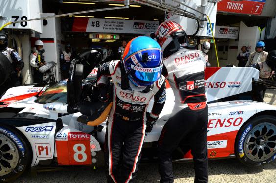 Drivers line up in teams of three per car (AFP/Getty)