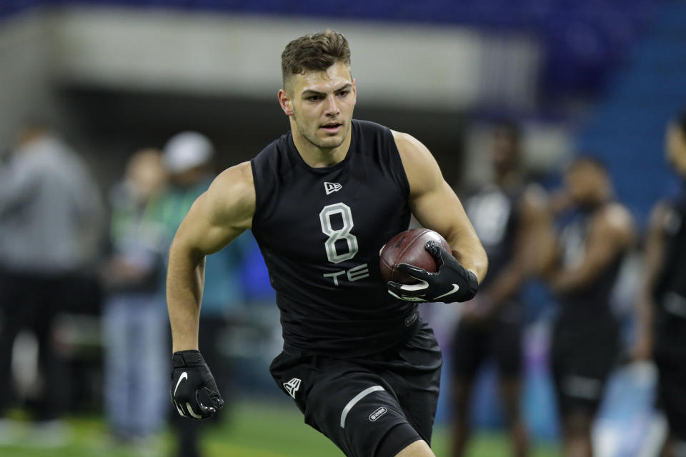 FILE - In this Feb. 27, 2020, file photo, Notre Dame tight end Cole Kmet runs a drill at the NFL football scouting combine in Indianapolis. Kmet was selected by the Chicago Bears in the second round of the NFL football draft Friday, April 24, 2020. (AP Photo/Michael Conroy, File)