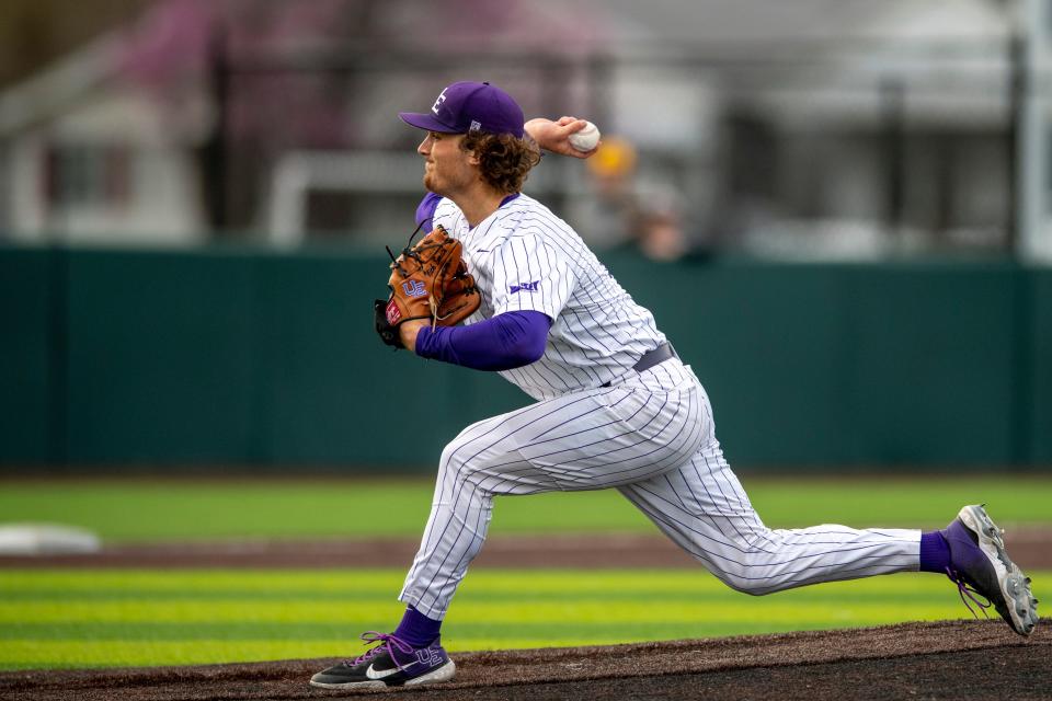 Evansville’s Nick Smith (35) pitches as the University of Evansville Purple Aces play the Valparaiso University Beacons at Charles H. Braun Stadium in Evansville, Ind., Friday evening, April 7, 2023.