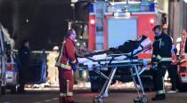 <p>An injured person is carried on a stretcher at the scene where a truck crashed into a Christmas market in Berlin on 19 December 2016. Photo: Clemens Bilan/EPA via AAP</p>