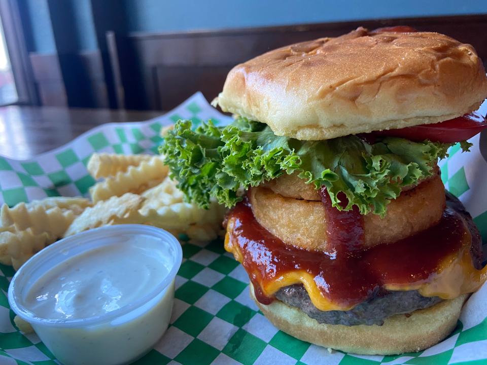 The Bruce Hornsby burger, which includes onion rings and barbecue sauce, at Micky's Irish Pub & Grill in Iowa City.