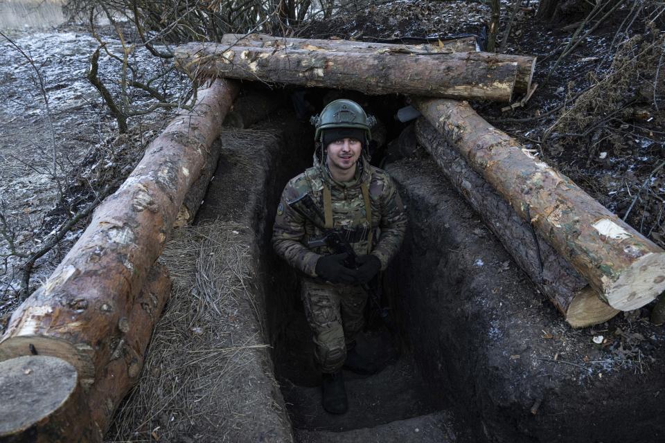 A Ukrainian serviceman stands at his position at the frontline near Bakhmut, Donetsk region, Ukraine, Wednesday, Jan. 11, 2023. (AP Photo/Evgeniy Maloletka)