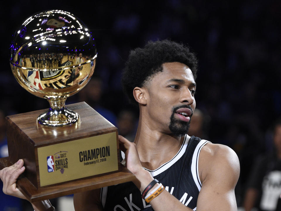 Brooklyn Nets guard Spencer Dinwiddie holds up his trophy after winning the 2018 Taco Bell Skills Challenge at All-Star Saturday Night in Los Angeles. (AP)