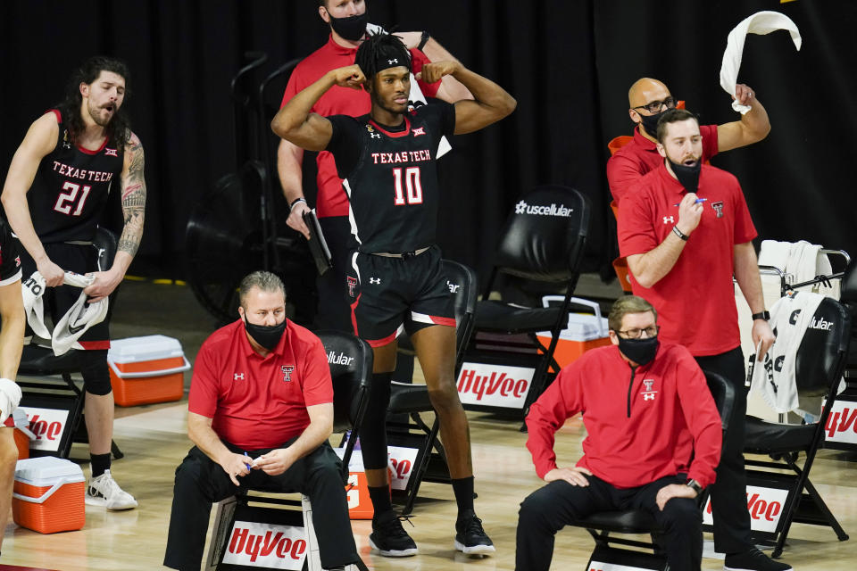 Texas Tech forward Tyreek Smith (10) reacts on the bench during the first half of an NCAA college basketball game against Iowa State, Saturday, Jan. 9, 2021, in Ames, Iowa. (AP Photo/Charlie Neibergall)