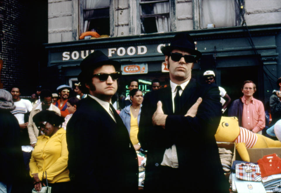 American actor John Belushi and Canadian actor and screenwriter Dan Aykroyd on the set of The Blues Brothers directed by John Landis. (Photo by Sunset Boulevard/Corbis via Getty Images)