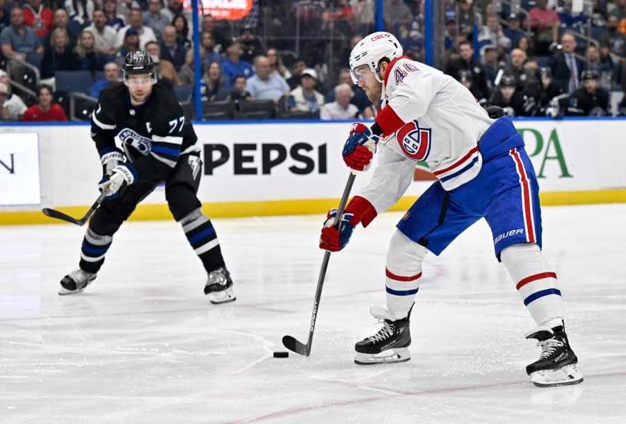 Montreal Canadiens right wing Joel Armia (40) scores during the first period of an NHL hockey game against the Tampa Bay Lightning Saturday, March 2, 2024, in Tampa, Fla. (AP Photo/Jason Behnken)