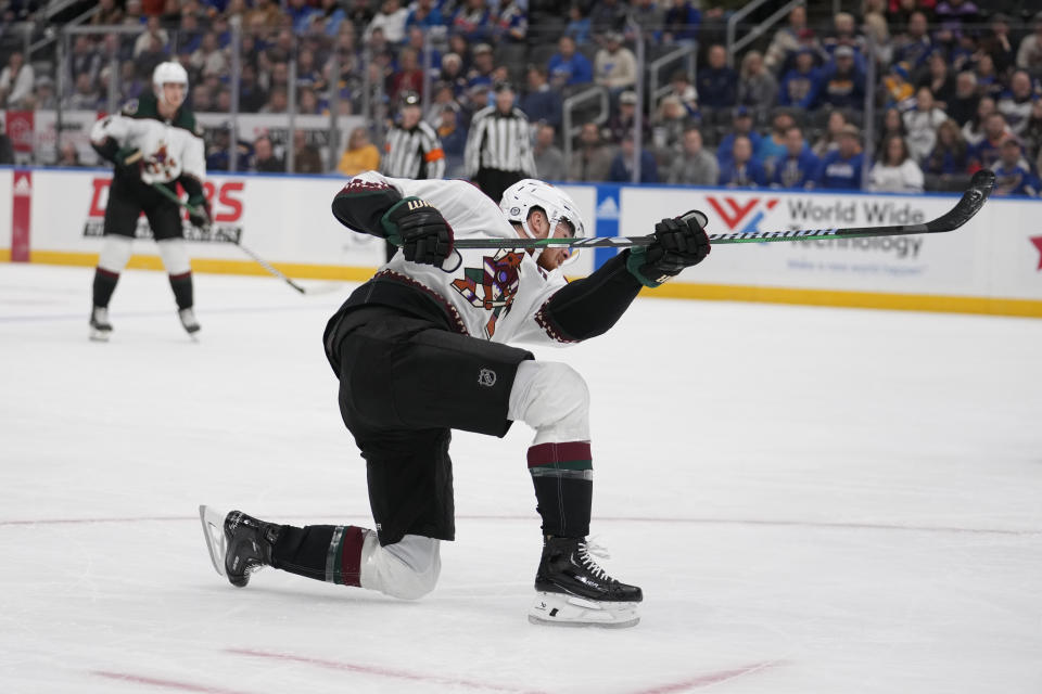 Arizona Coyotes' Lawson Crouse scores during the first period of an NHL hockey game against the St. Louis Blues Thursday, Nov. 9, 2023, in St. Louis. (AP Photo/Jeff Roberson)