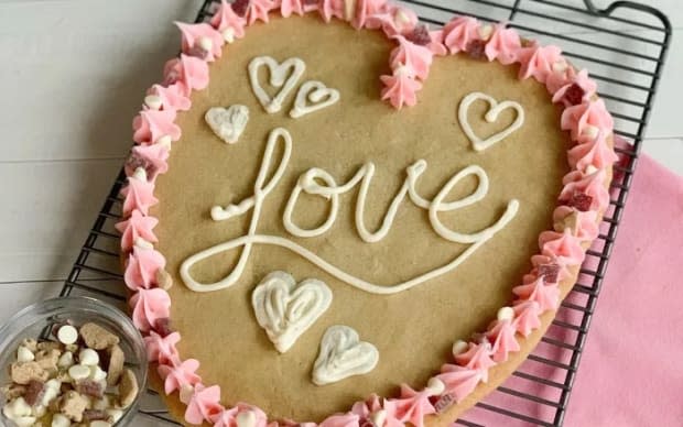 <p><a href="https://parade.com/1162849/solanahawkenson/treat-your-galentines-to-a-giant-heart-shaped-cookie/" rel="nofollow noopener" target="_blank" data-ylk="slk:Nestle Toll House;elm:context_link;itc:0;sec:content-canvas" class="link ">Nestle Toll House</a></p>