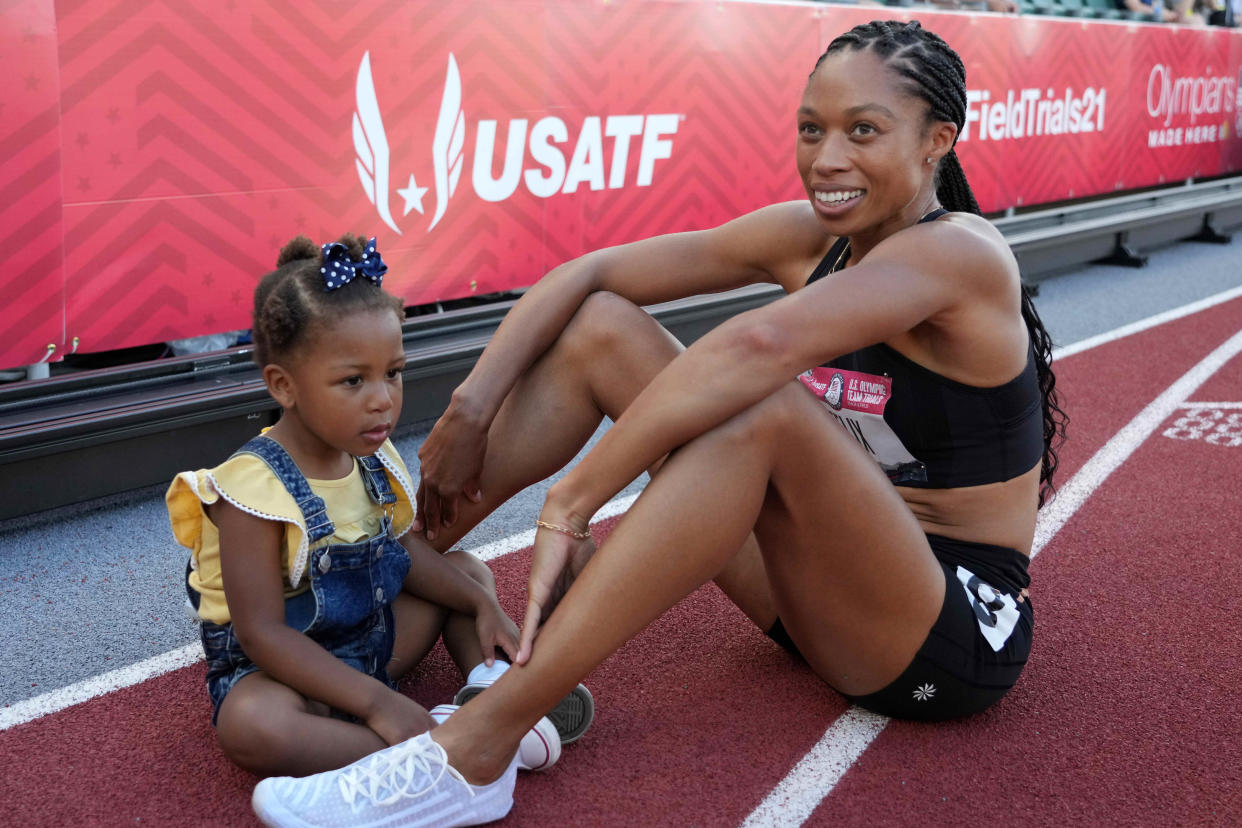 Jun 20, 2021; Eugene, OR, USA; Allyson Felix poses with daughter Camryn Ferguson after placing second in the women's 400m during the US Olympic Team Trials at Hayward Field. Mandatory Credit: Kirby Lee-USA TODAY Sports