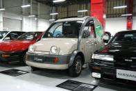 <p>Perhaps the quirkiest car in Nissan's collection, <a href="https://www.roadandtrack.com/car-culture/classic-cars/a31166/nissan-s-cargo/" rel="nofollow noopener" target="_blank" data-ylk="slk:the S-Cargo;elm:context_link;itc:0;sec:content-canvas" class="link ">the S-Cargo</a>. The name, a play on the word "escargot," is a nod to both its vast cargo capacity and its general snail-like shape. </p>