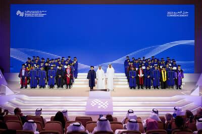The Class of 2023 with His Highness Sheikh Hamed bin Zayed Al Nahyan (center); His Excellency Dr. Sultan bin Ahmed Al Jaber, Minister of Industry and Advanced Technology, President-Designate of COP28 UAE and Chairman of MBZUAI's Board of Trustees(right); and Professor Eric Xing, MBZUAI President and University Professor (left).