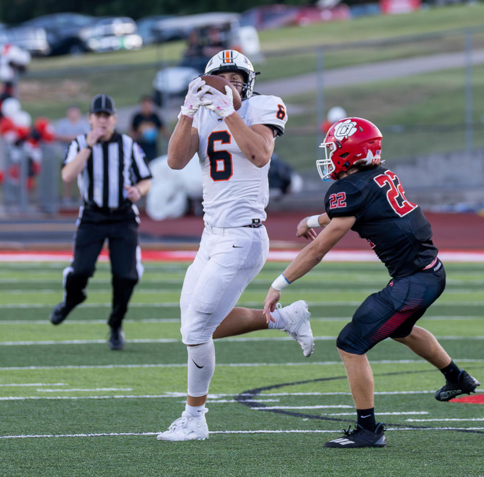 Republic TE James Rexroat hauls in a pass during the first half of the Tigers game against Ozark on August 31, 2023.