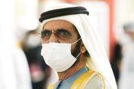 Dubai ruler Sheikh Mohammed bin Rashid Al Maktoum leaves after an event at Abu Dhabi Sustainability Week at Dubai Expo 2020 in Dubai, United Arab Emirates, Monday, Jan. 17, 2022. (AP Photo/Jon Gambrell)