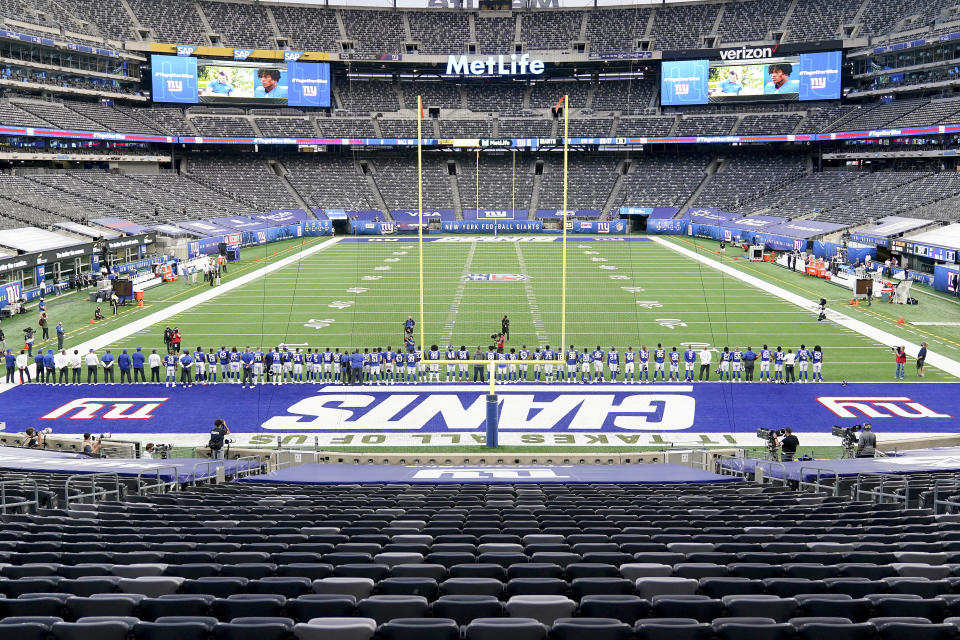 New York Giants players line up on the field for a video tribute to Black history before playing against the Pittsburgh Steelers in an NFL football game Monday, Sept. 14, 2020, in East Rutherford, N.J. (AP Photo/Seth Wenig)