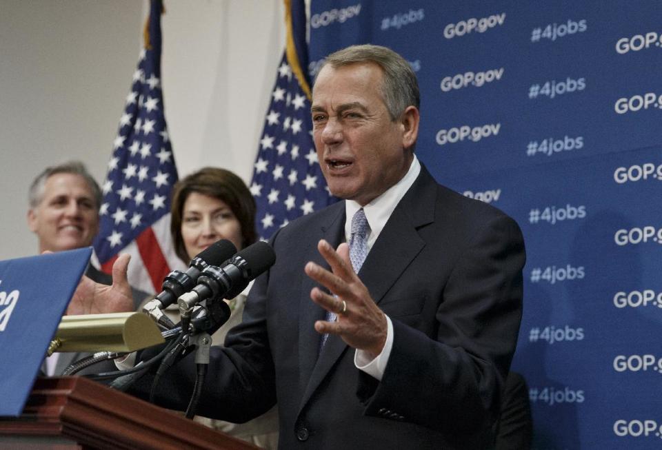 House Speaker John Boehner of Ohio, right, accompanied by House Majority Whip Kevin McCarthy of Calif., left, and Rep. Cathy McMorris Rodgers, R-Wash., speak to reporters about the Keystone XL Pipeline and other issues, following a Republican Conference meeting, Tuesday, Feb. 4, 2014, on Capitol Hill in Washington. (AP Photo/J. Scott Applewhite)