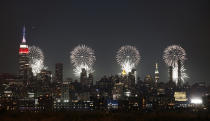 <p>The Macy’s fireworks show lights up the sky over New York City on July 4, 2017, as seen from Union City, NJ. (Gary Hershorn/Getty Images) </p>