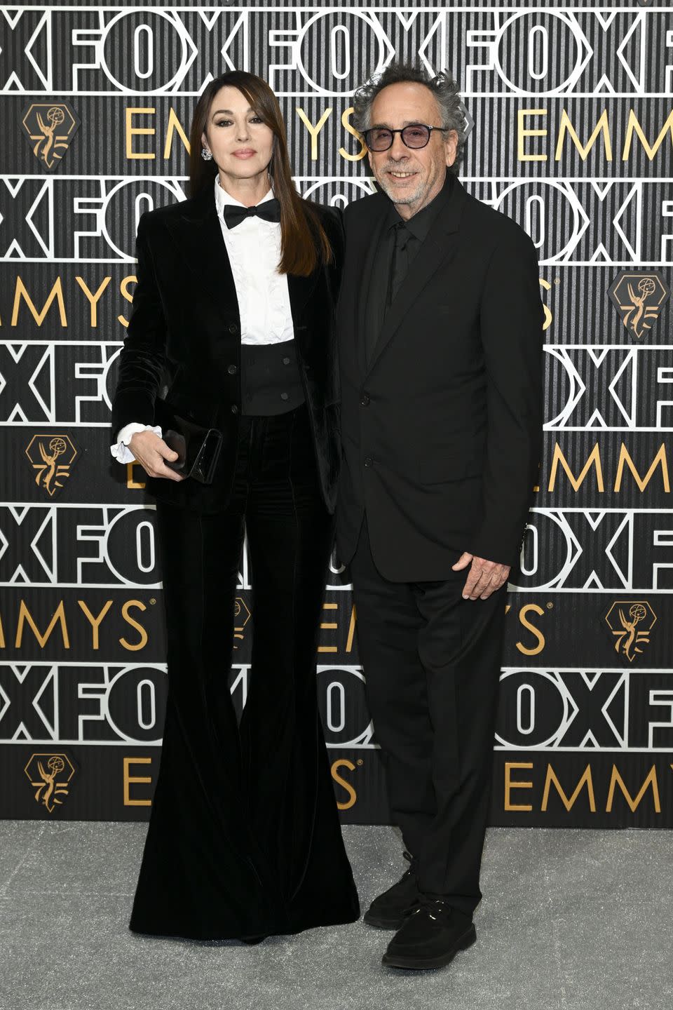 monica bellucci and tim burton at 75th primetime emmy awards