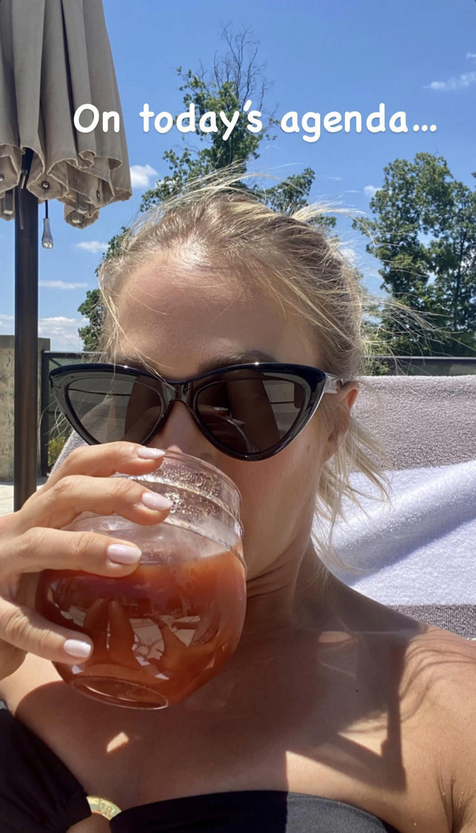 <p>The country singer had a lazy holiday as she sipped drinks by the pool on her Instagram Story. </p>