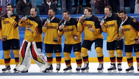 Ice Hockey - Pyeongchang 2018 Winter Olympics - Men Final Match - Olympic Athletes from Russia v Germany - Gangneung Hockey Centre, Gangneung, South Korea - February 25, 2018 - German team players celebrate with their silver medals.