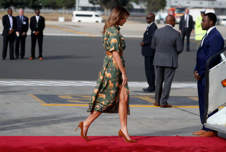 U.S. first lady Melania Trump boards an aircraft as she departs Nairobi, Kenya, October 6, 2018. REUTERS/Carlo Allegri