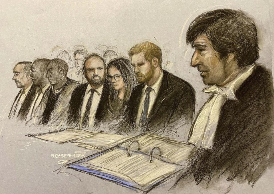 This court artist sketch by Elizabeth Cook shows Prince Harry, second right, in court at the Royal Courts Of Justice, central London, Monday, March 27, 2023. Prince Harry was in a London court as the lawyer for a group of British tabloids prepared to ask a judge to toss out lawsuits by the Prince, Elton John and several other celebrities who allege phone tapping and other invasions of privacy. (Elizabeth Cook/PA via AP)