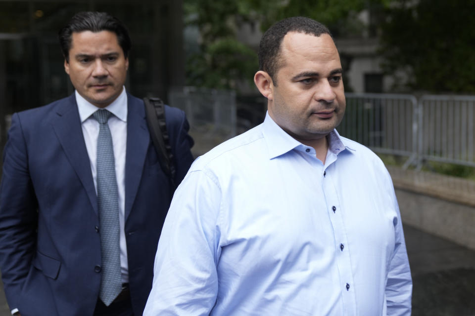 FILE - Wael Hana, right, leaves the federal courthouse in New York, Tuesday, Sept. 26, 2023. For the second time in a decade, Sen. Bob Menendez, D-N.J., faces a corruption trial Monday, May 13, 2024, with his political career and freedom on the line. Hana is accused of paying off Menendez for helping him get a lucrative deal with the Egyptian government to certify that imported meat met Islamic dietary requirements. (AP Photo/Seth Wenig, File)