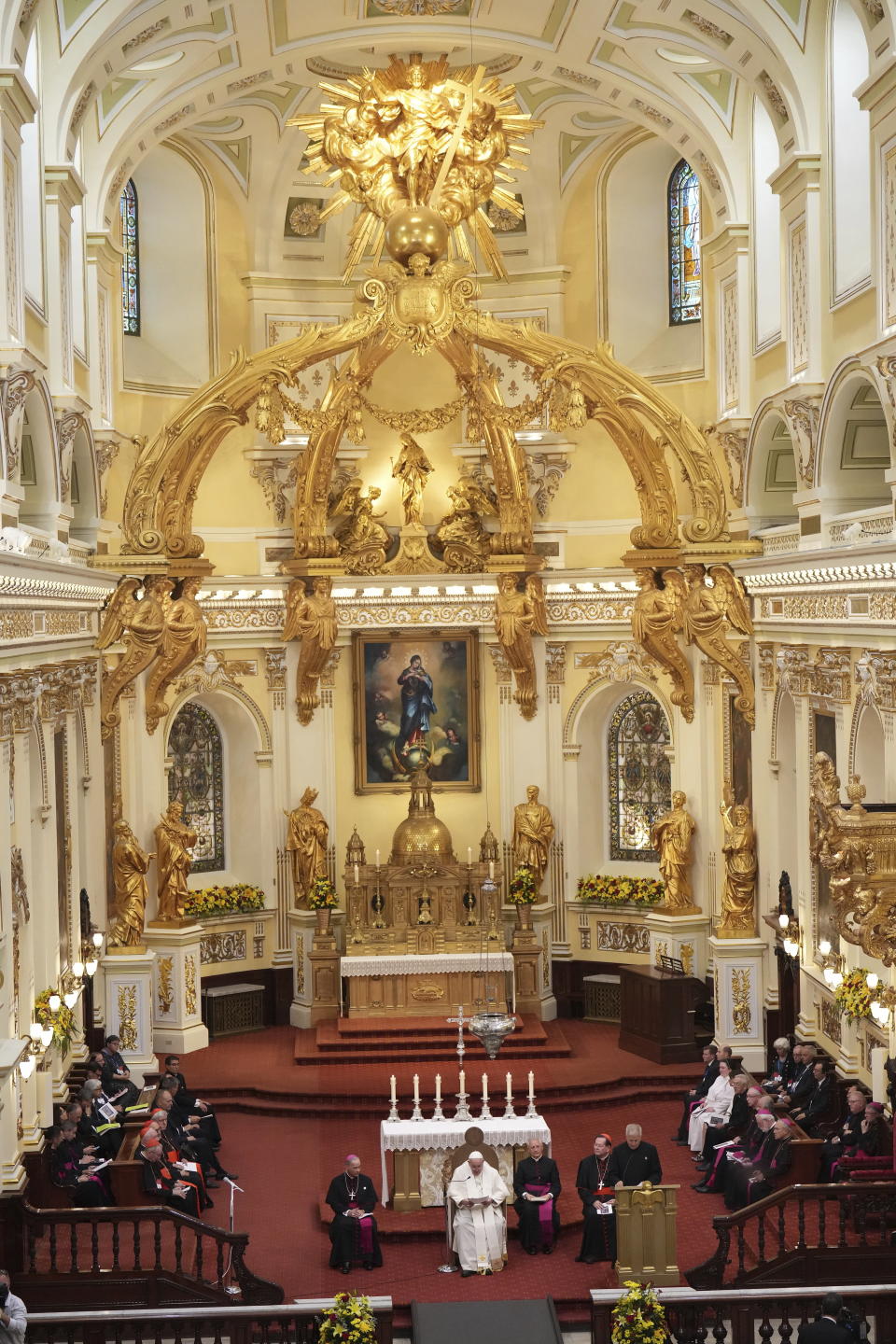 Pope Francis, center bottom, presides over an evening prayer service at the Cathedral-Basilica of Notre-Dame de Quebec in Quebec City during his papal visit across Canada, Thursday, July 28, 2022. (Nathan Denette/The Canadian Press via AP)