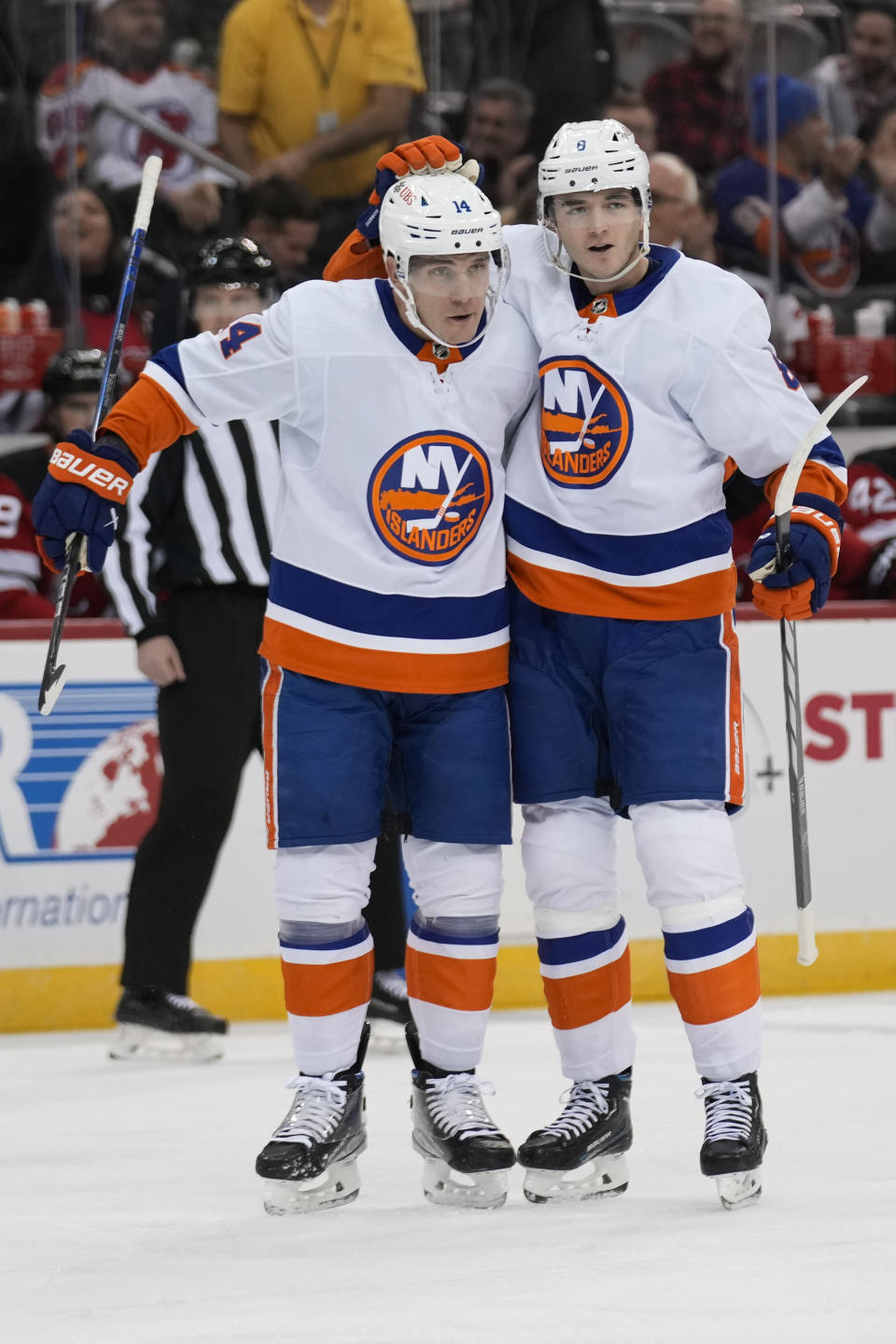 New York Islanders' Bo Horvat, left, celebrates his goal with Noah Dobson during the first period of an NHL hockey game against the New Jersey Devils in Newark, N.J., Tuesday, Nov. 28, 2023. (AP Photo/Seth Wenig)