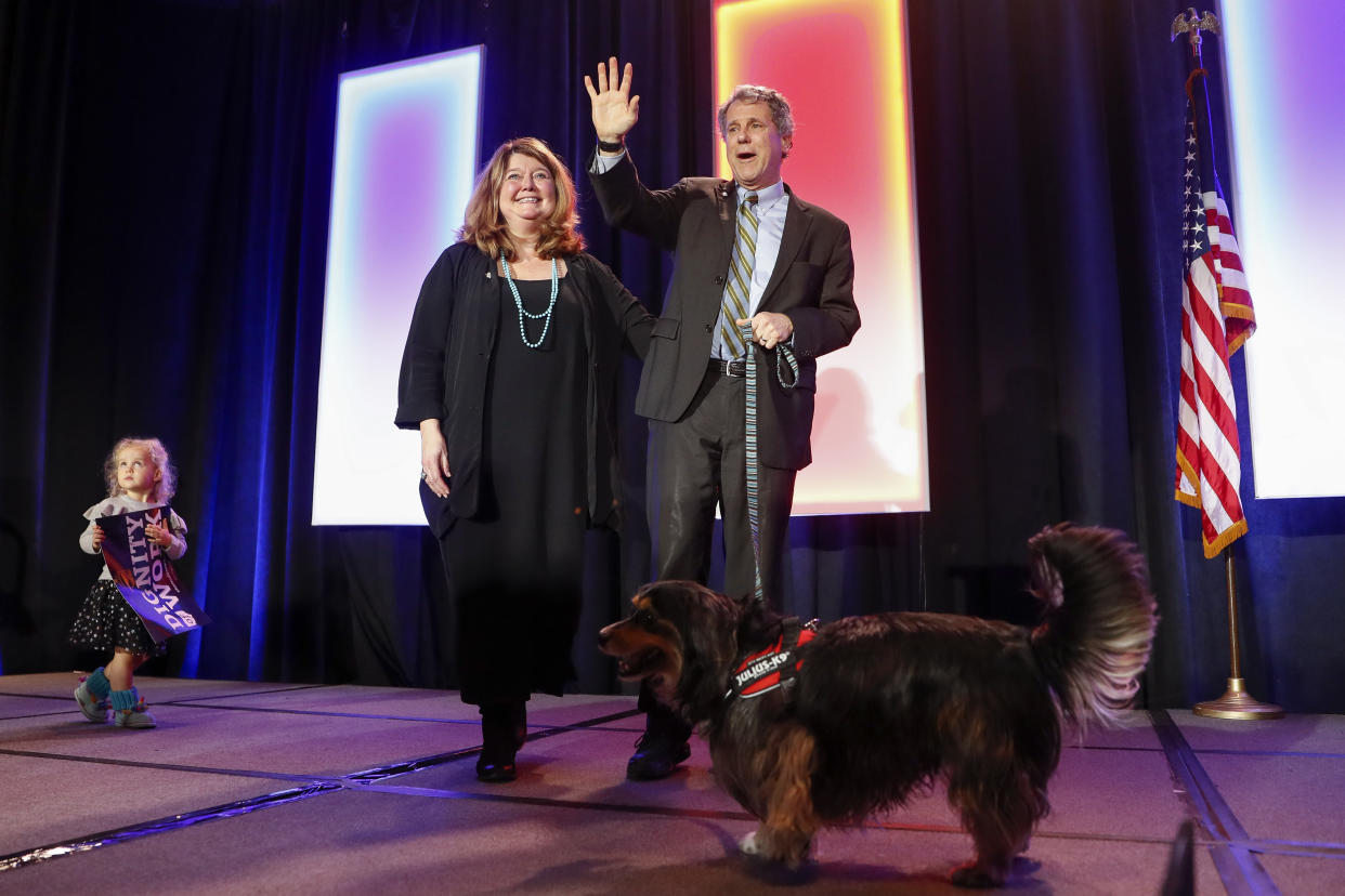 Sen. Sherrod Brown, D-Ohio, takes the stage alongside his wife, Connie Schultz, during an election-night watch party on Nov. 6, 2018, in Columbus. (Photo: John Minchillo/AP)