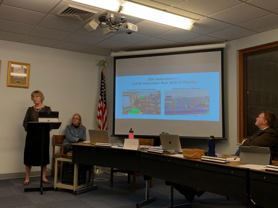 Kathy Petersen shares an update about the Northmen Den Youth Services food pantries during a Public Schools of Petoskey Board of Education meeting on Nov. 16, 2023.